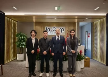 alex danos in business meetings in beijing